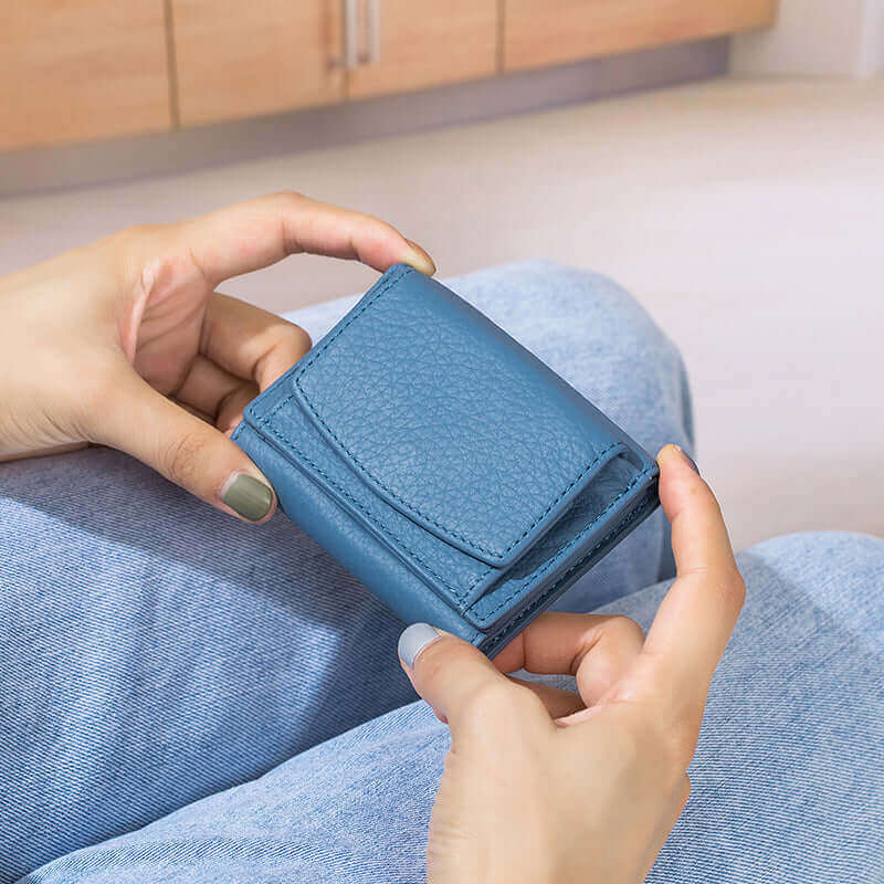 Women's blue RFID leather wallet, designed for secure storage with multiple card slots.