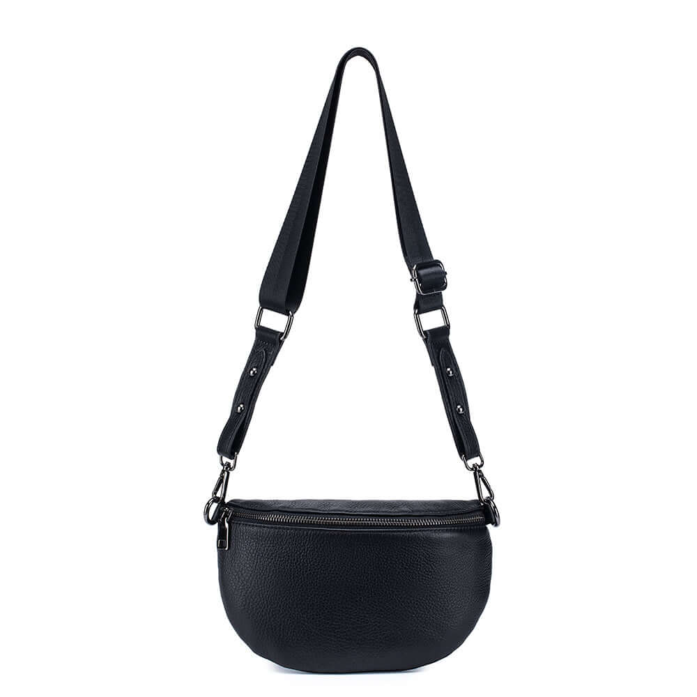 Black leather chest bag for women with adjustable strap.