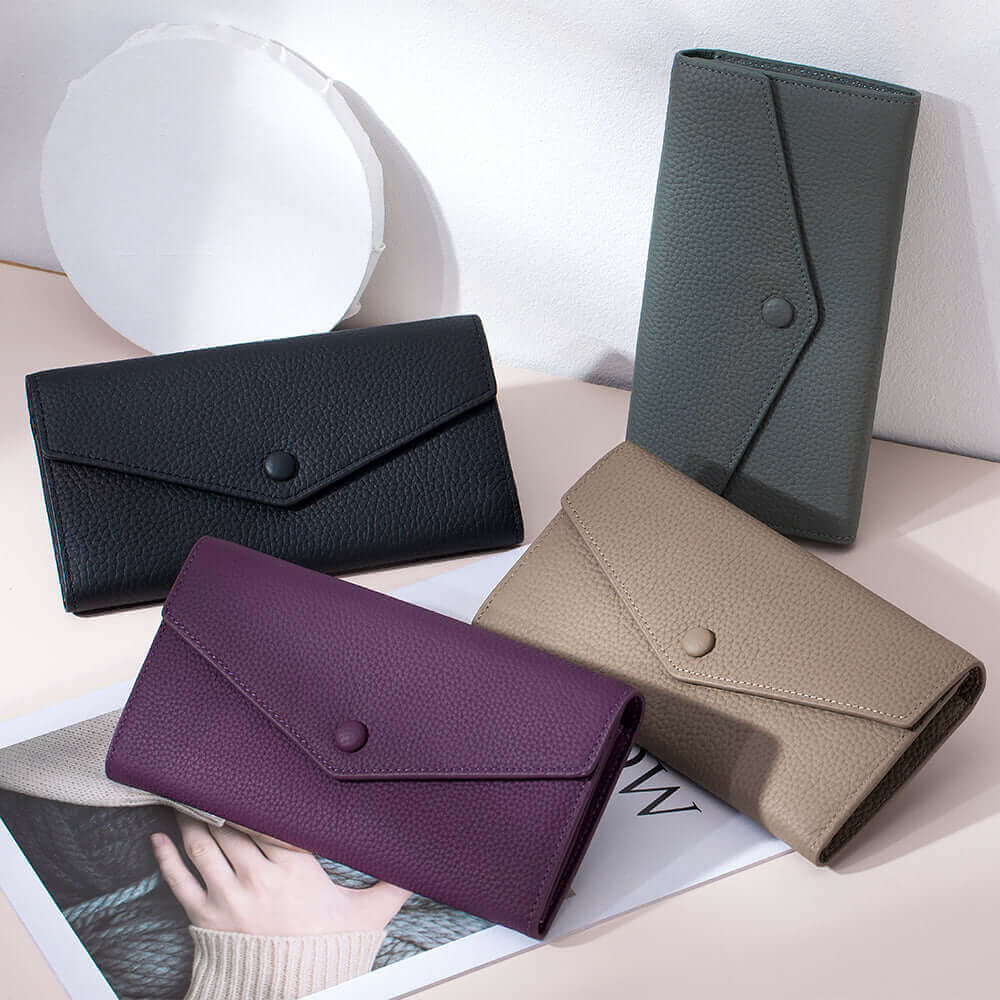 Women's Leather Bifold Envelope Wallet in various color options, showcasing the collection.