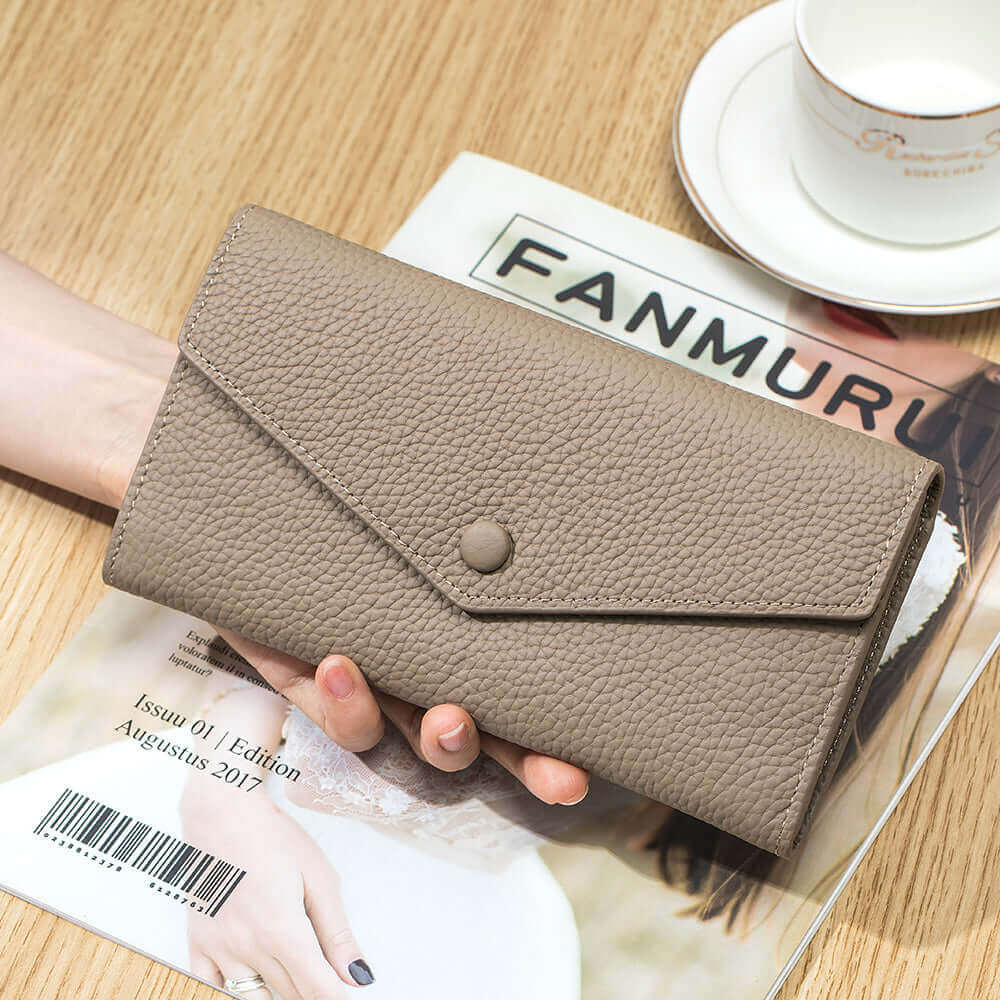 Front view of the Women's Leather Bifold Envelope Wallet in gray, featuring the elegant envelope closure.