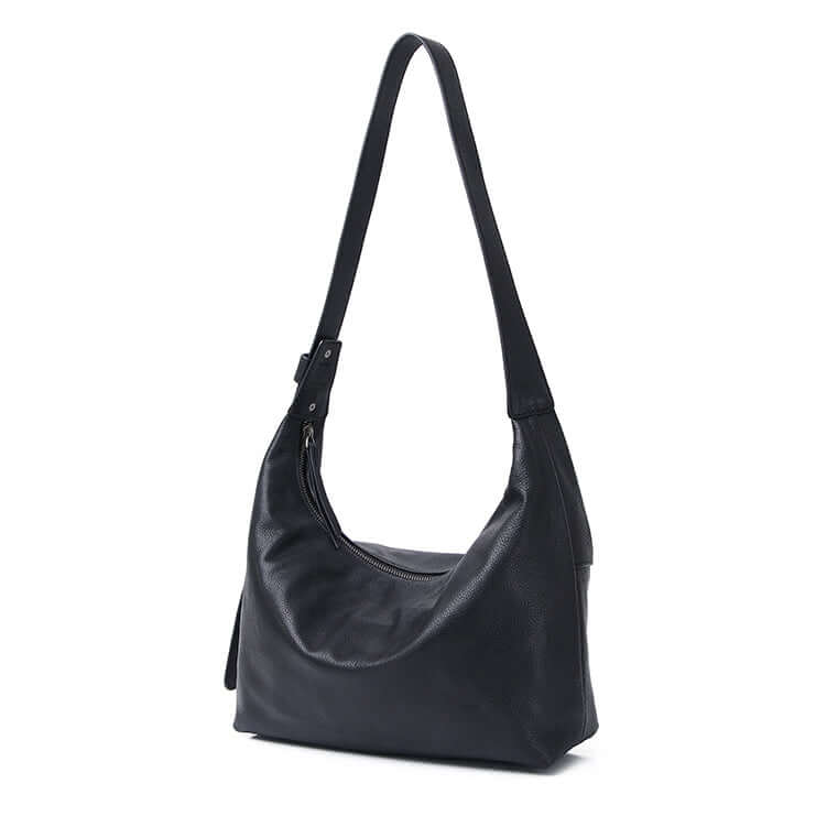 Side view of the women's black leather shoulder and crossbody bag.