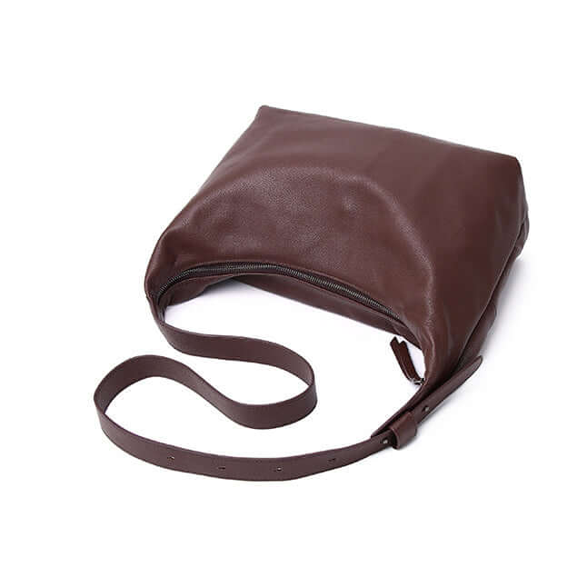 Closeup of the women's coffee brown leather shoulder and crossbody bag.