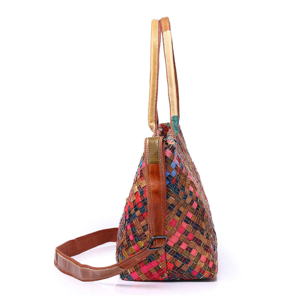 Side view of colorful woven leather tote bag showcasing intricate design.