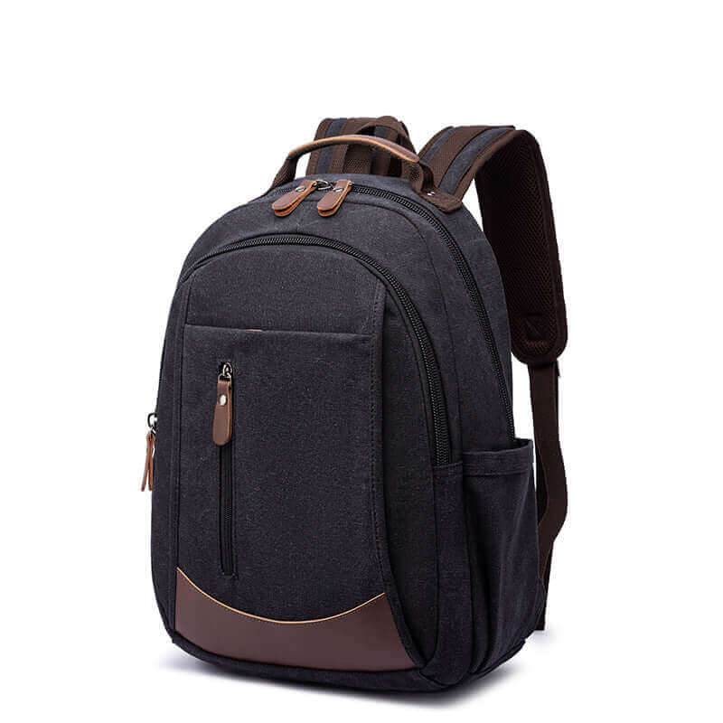 Canvas and leather backpack designed to fit a 15.6-inch laptop comfortably.