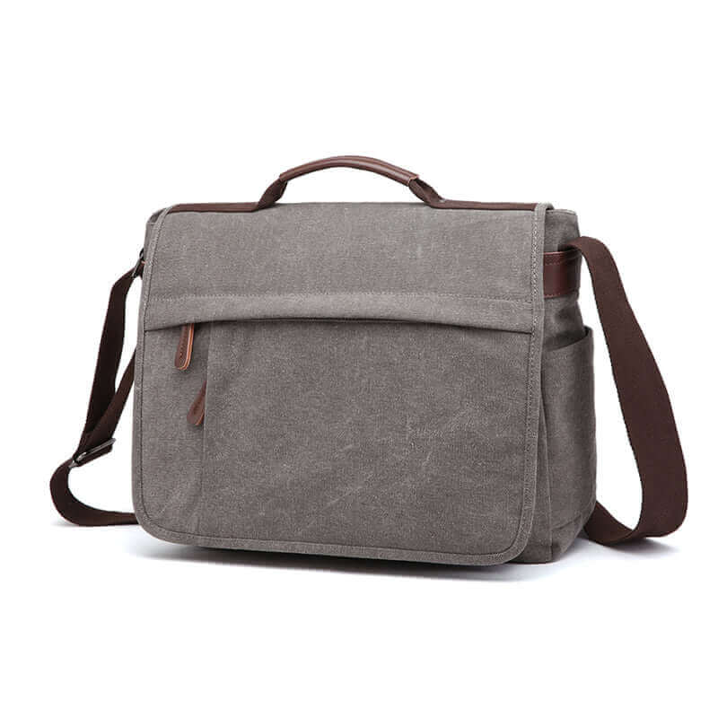 Canvas messenger bag for men, fits 17-inch laptops with ease.