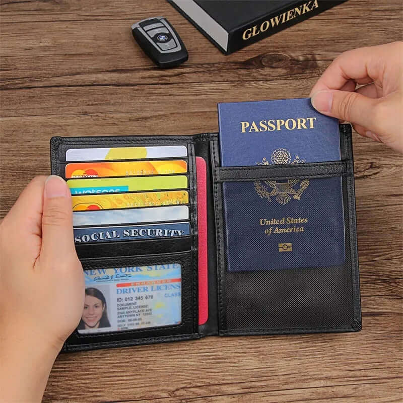 RFID travel wallet in black leather with multiple compartments.