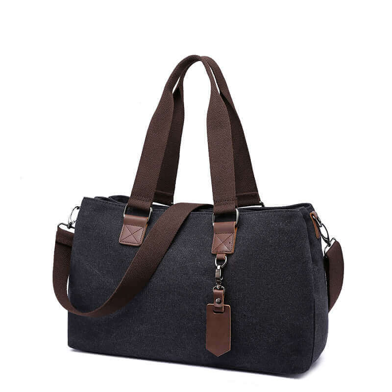 Canvas crossbody tote for women featuring multiple compartments for better organization.