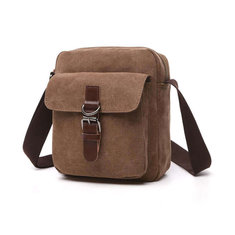 Casual coffee canvas crossbody bag with decorative buckle and leather accents.