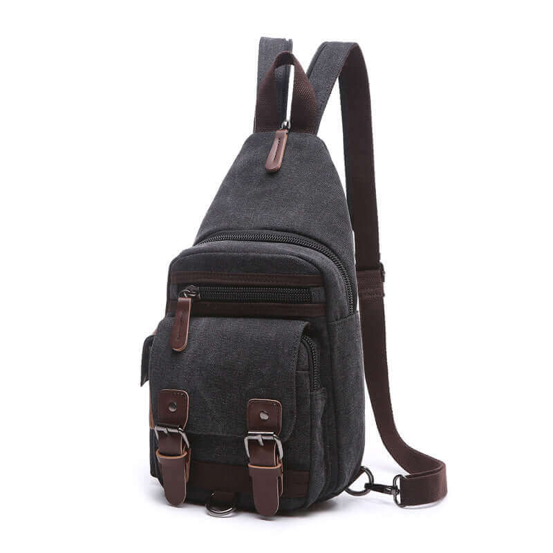 Compact canvas crossbody bag, ideal for urban use with efficient storage compartments.