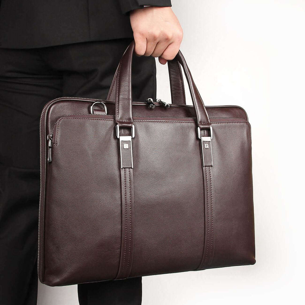 Compact and lightweight slim leather laptop bag for professionals.