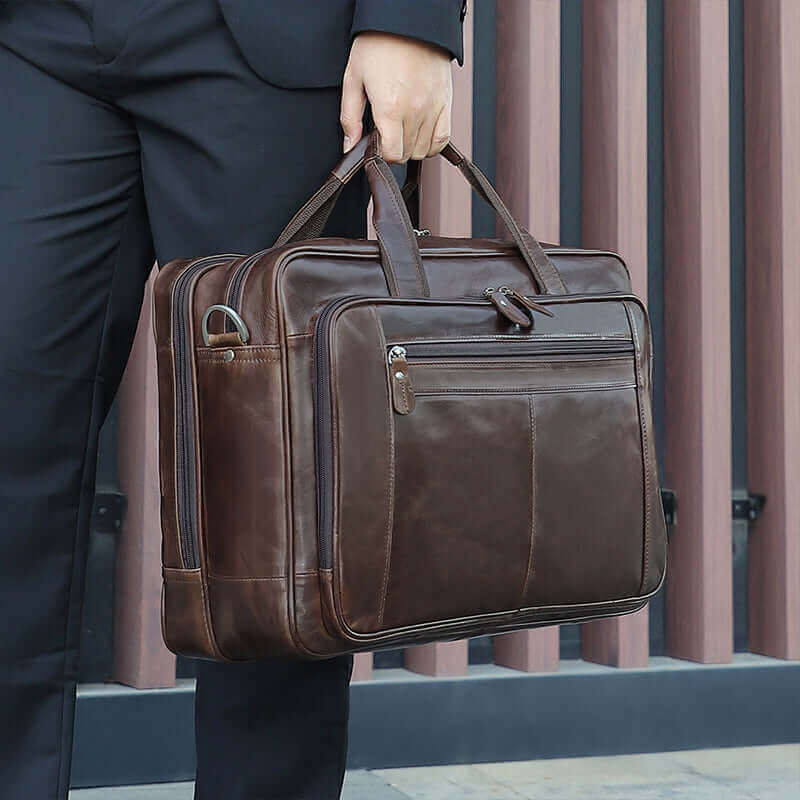 Large-capacity leather bag showcasing room for laptops and essentials.