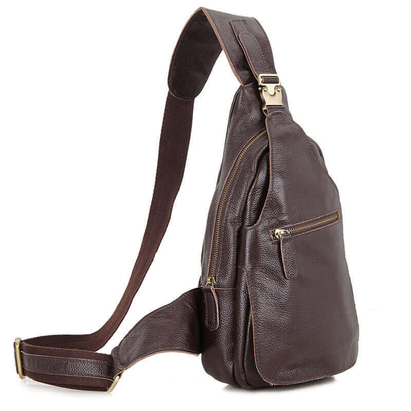 Side view of a leather crossbody sling bag showcasing its adjustable strap.

