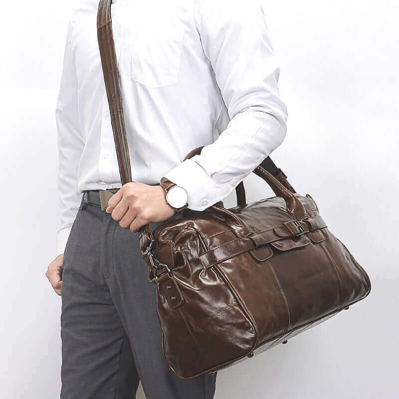 Coffee leather travel bag with 23L capacity for New Zealand travelers.