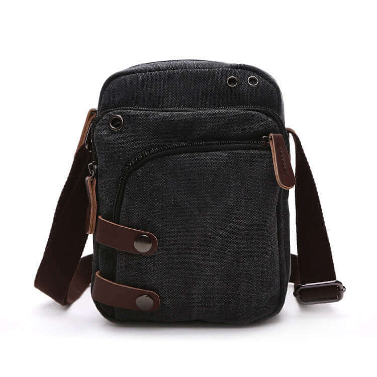 Lightweight men's canvas crossbody bag with adjustable shoulder strap.