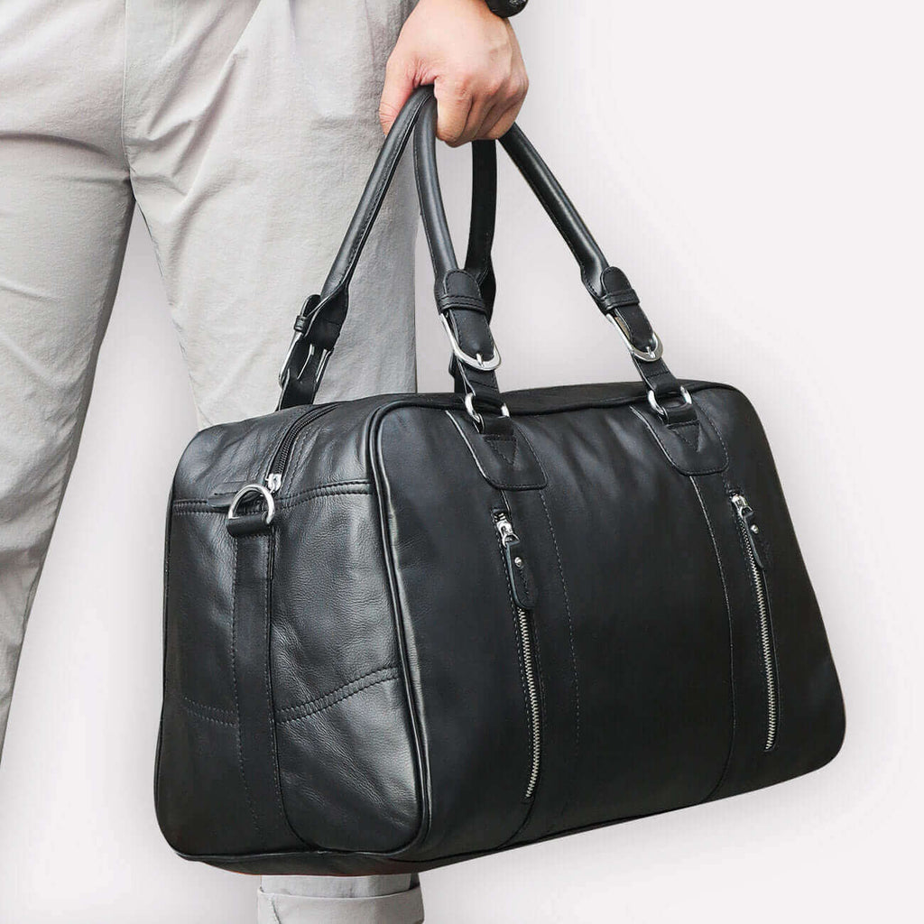 Luxurious leather duffle bag, perfect for business trips and weekend getaways.