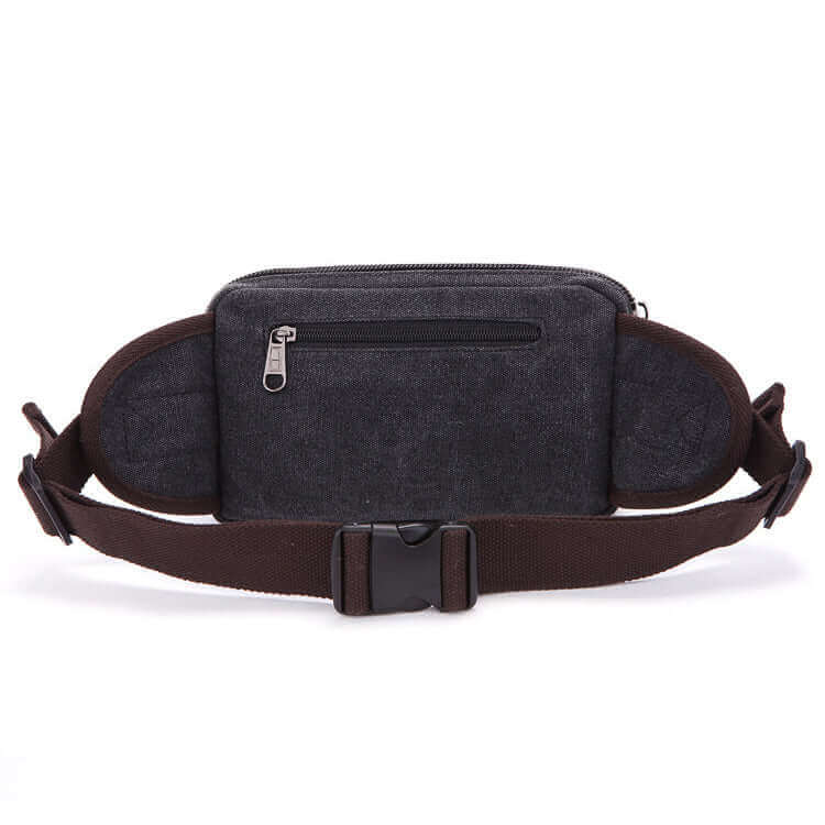 Men's canvas waist bag, designed for travel with easy-to-access zippered compartments.