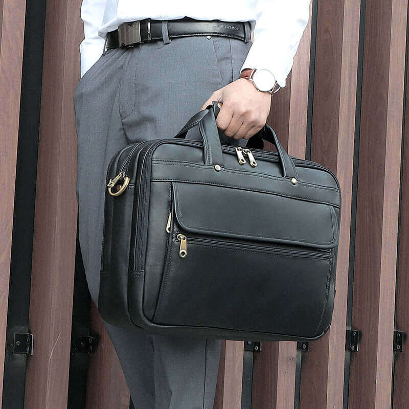 Men's Black Leather Laptop Bag with space for a 15.6-inch laptop.