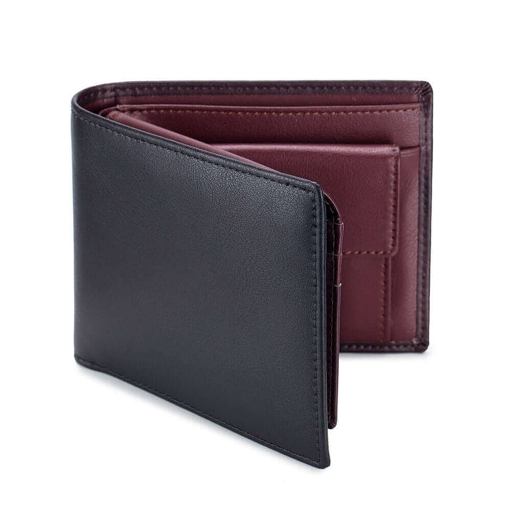 The coin pocket of the men's leather RFID bifold wallet filled with coins.