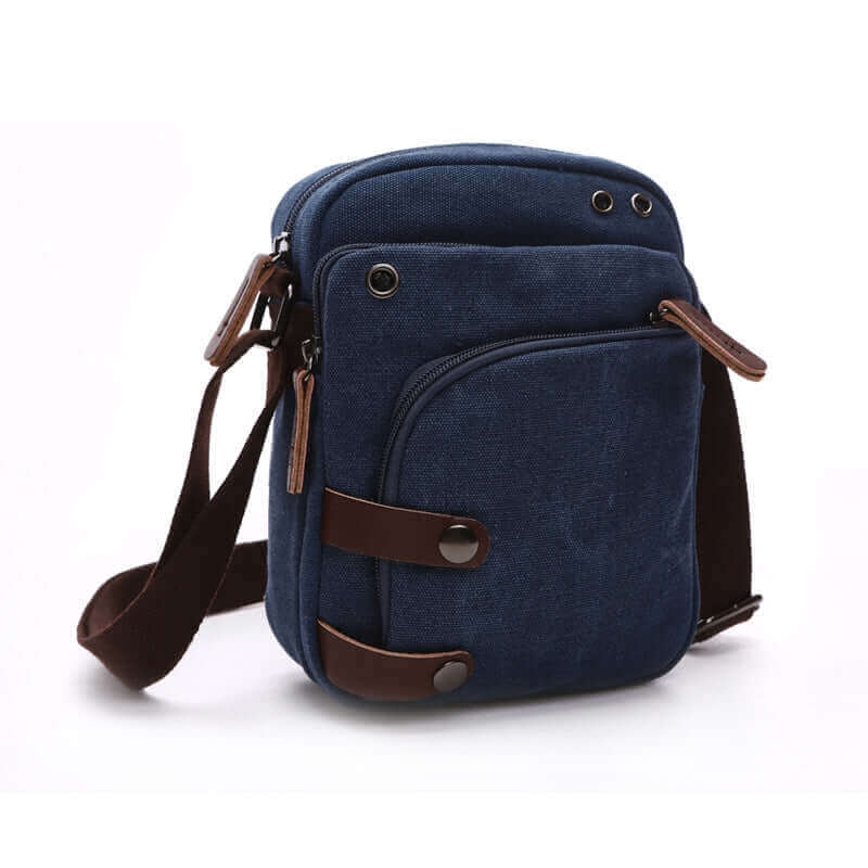 Stylish canvas crossbody bag for men with compact design and leather accents.