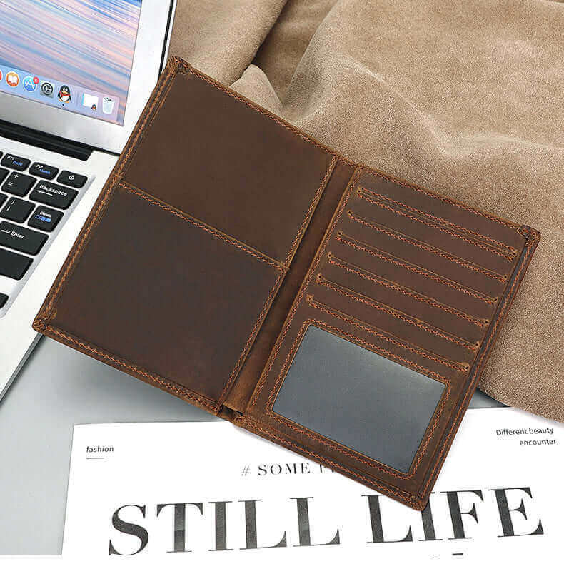 Genuine leather passport wallet with RFID protection and storage compartments.