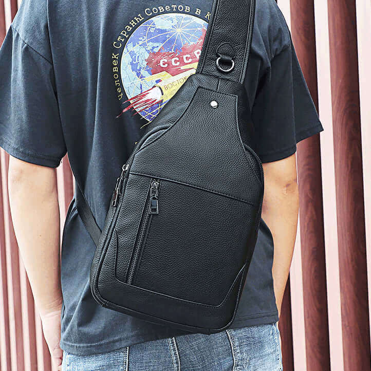 Black crossbody chest bag with secure zippered compartments in NZ.