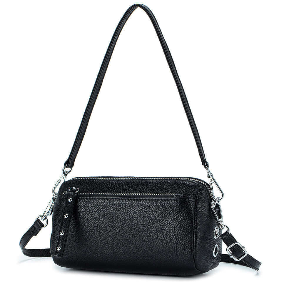 Sleek genuine leather shoulder crossbody bag in black with versatile straps and minimalist design.