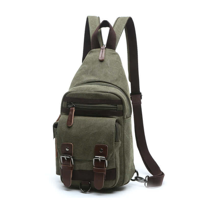 Small canvas sling backpack for travel, offering practical organization and storage.