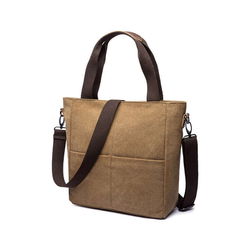 Versatile women's canvas tote bag with PU leather accents for casual and elegant looks.