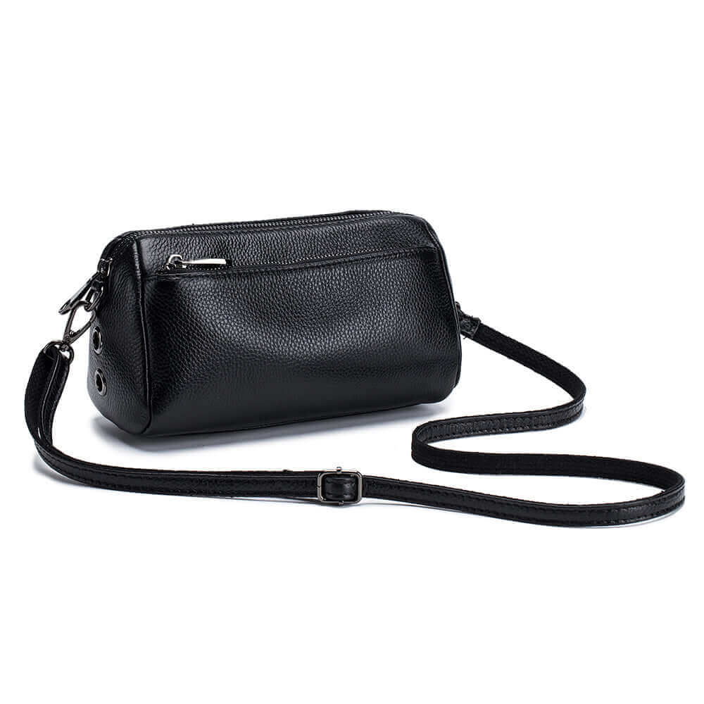 Women's small leather crossbody bag in black, designed for both style and practicality.