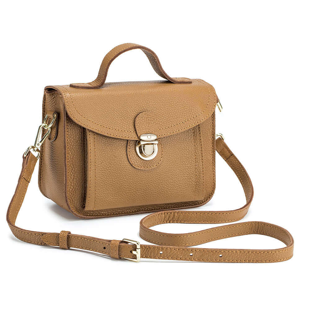 Women's small leather messenger bag in brown, perfect for daily outings with its versatile style.